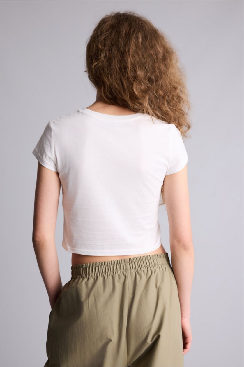 حريمي اوف وايت تيشيرت نص كم مخصر سليم فيت مطبوع