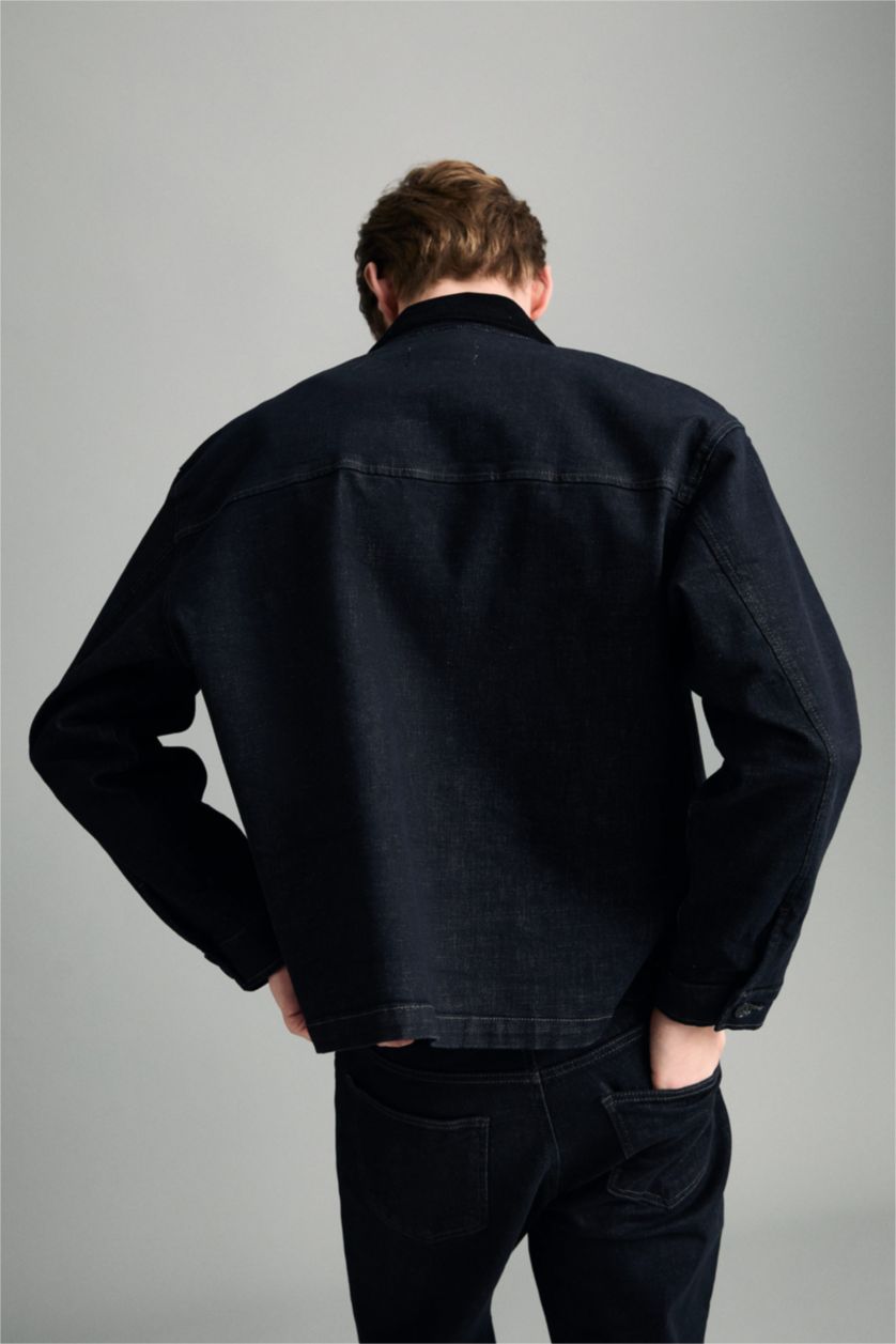 رجال أزرق غامق جاكيت قطن قصة عادية