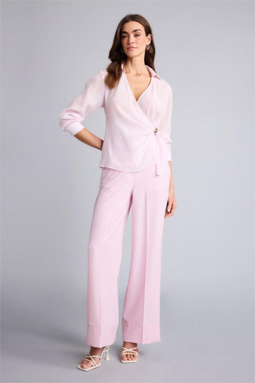 حريمي زهري فاتح بلوزة كم طويل قصة عادية بياقة متقاطعة