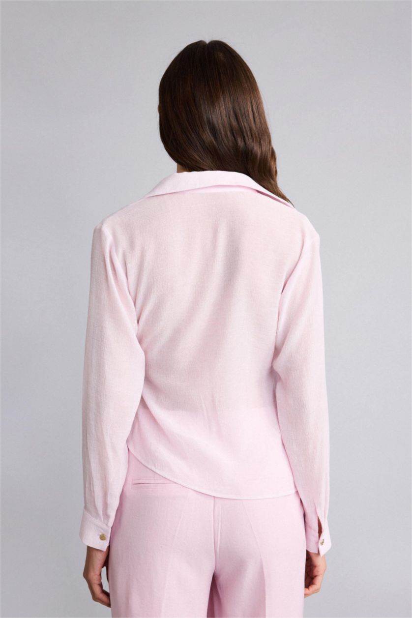 حريمي زهري فاتح بلوزة كم طويل قصة عادية بياقة متقاطعة