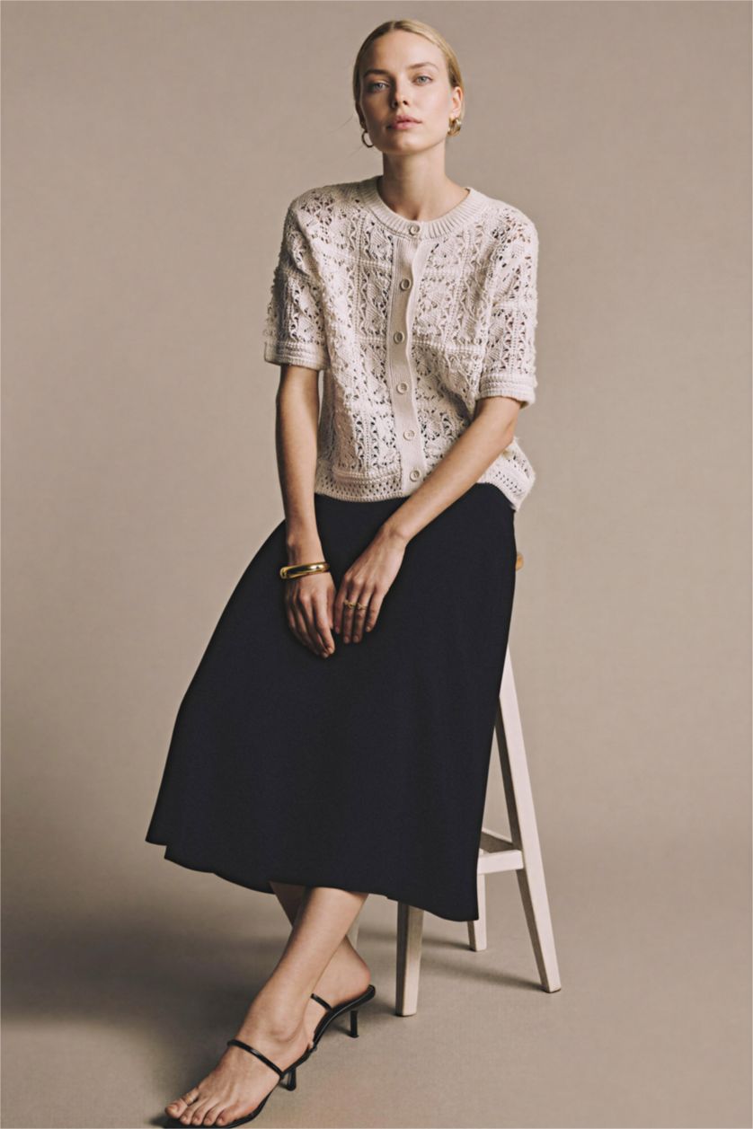 نساء بيج فاتح سترة تريكو قصة عادية برقبة مستديرة