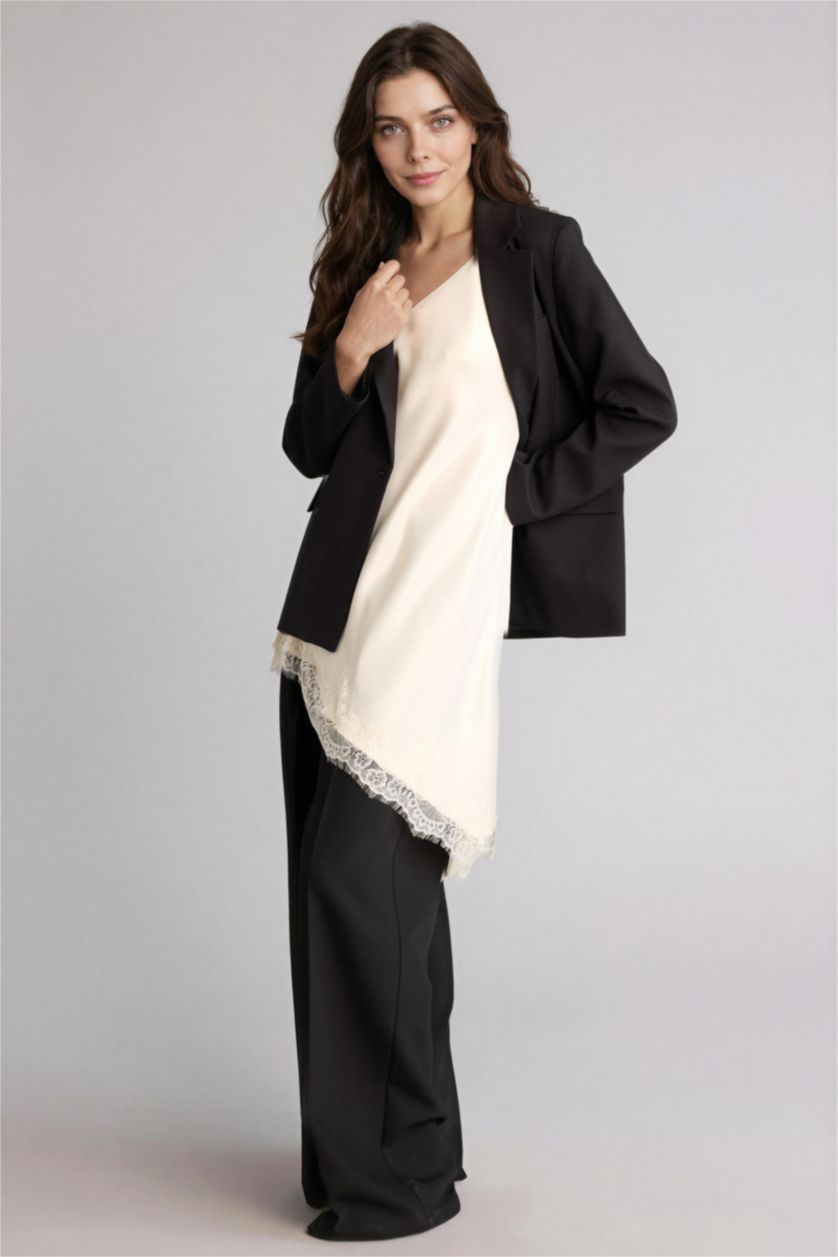 نساء بيج فاتح بلوزة طويلة ستان قصة عادية وياخة V