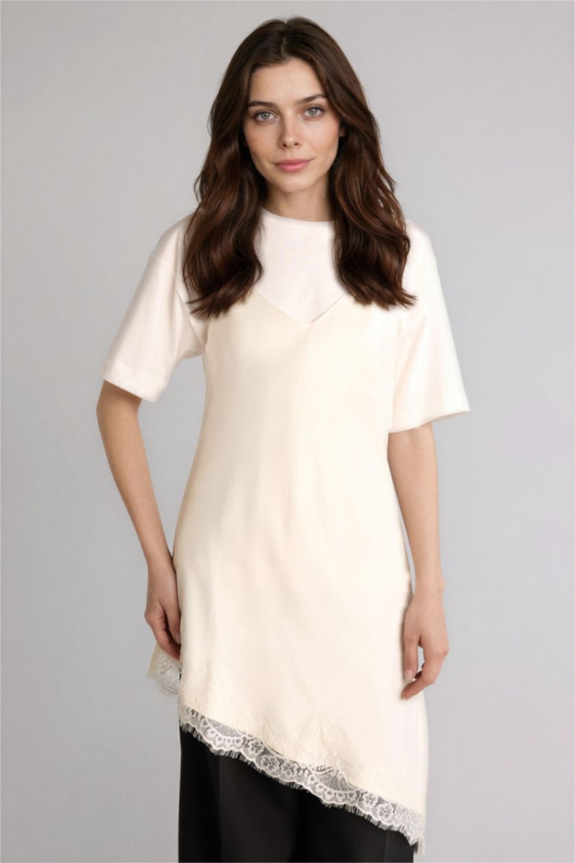 نساء بيج فاتح بلوزة طويلة ستان قصة عادية وياخة V