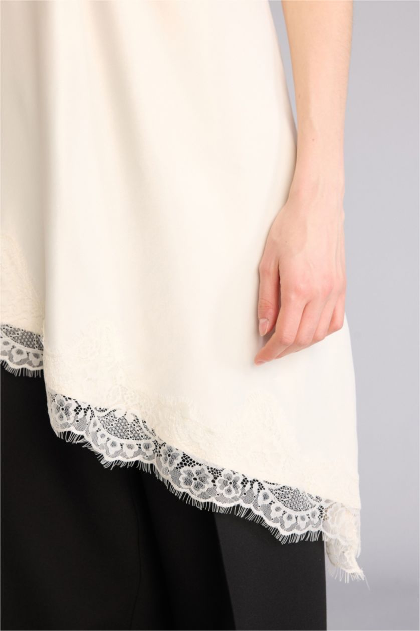 نساء بيج فاتح بلوزة طويلة ستان قصة عادية وياخة V