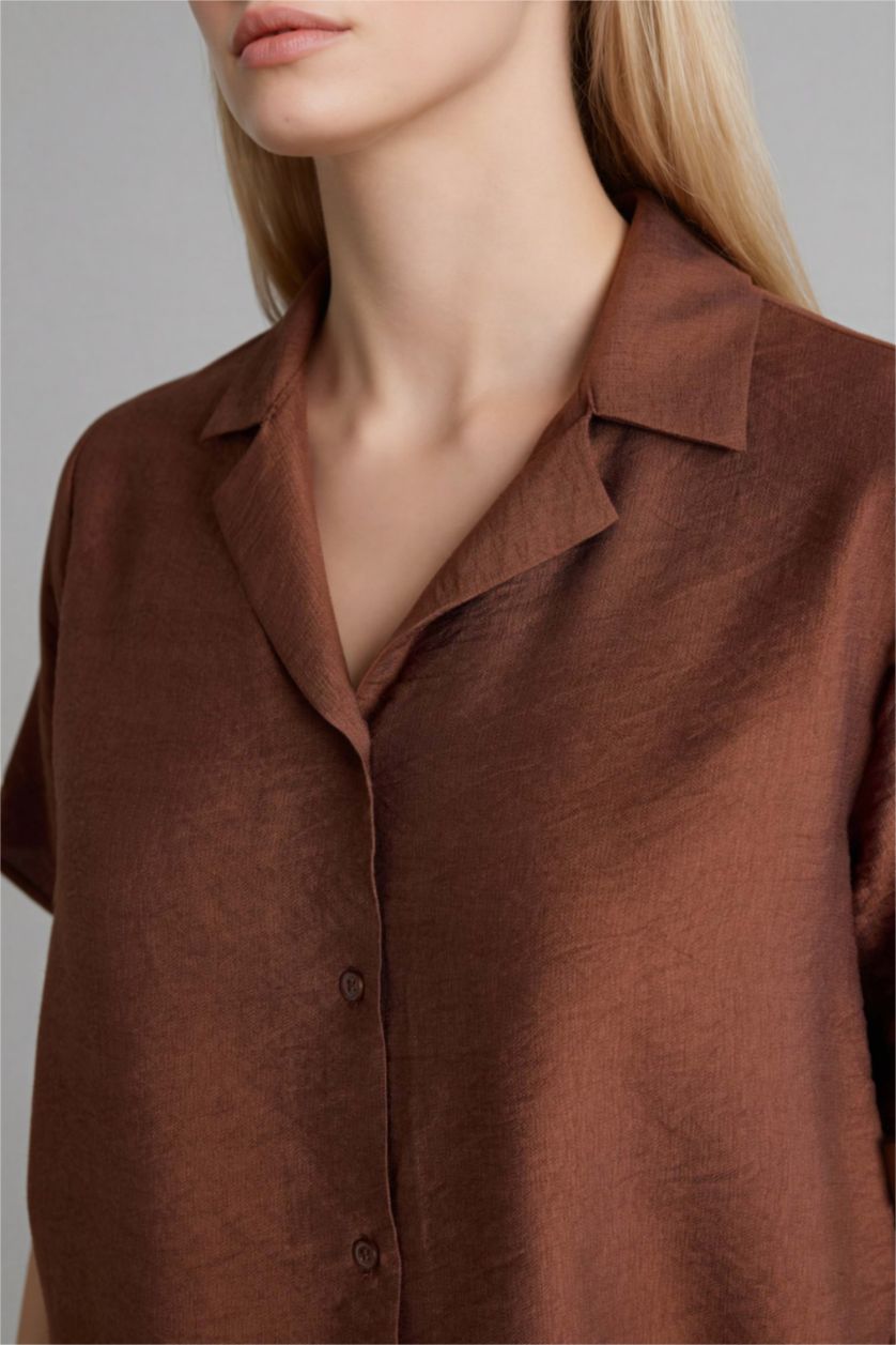 حريمي بني فاتح قميص بولو نص كم قصة عادية