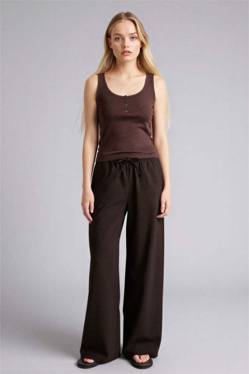 نساء بني سروال واسع بخصر عادي وجيوب