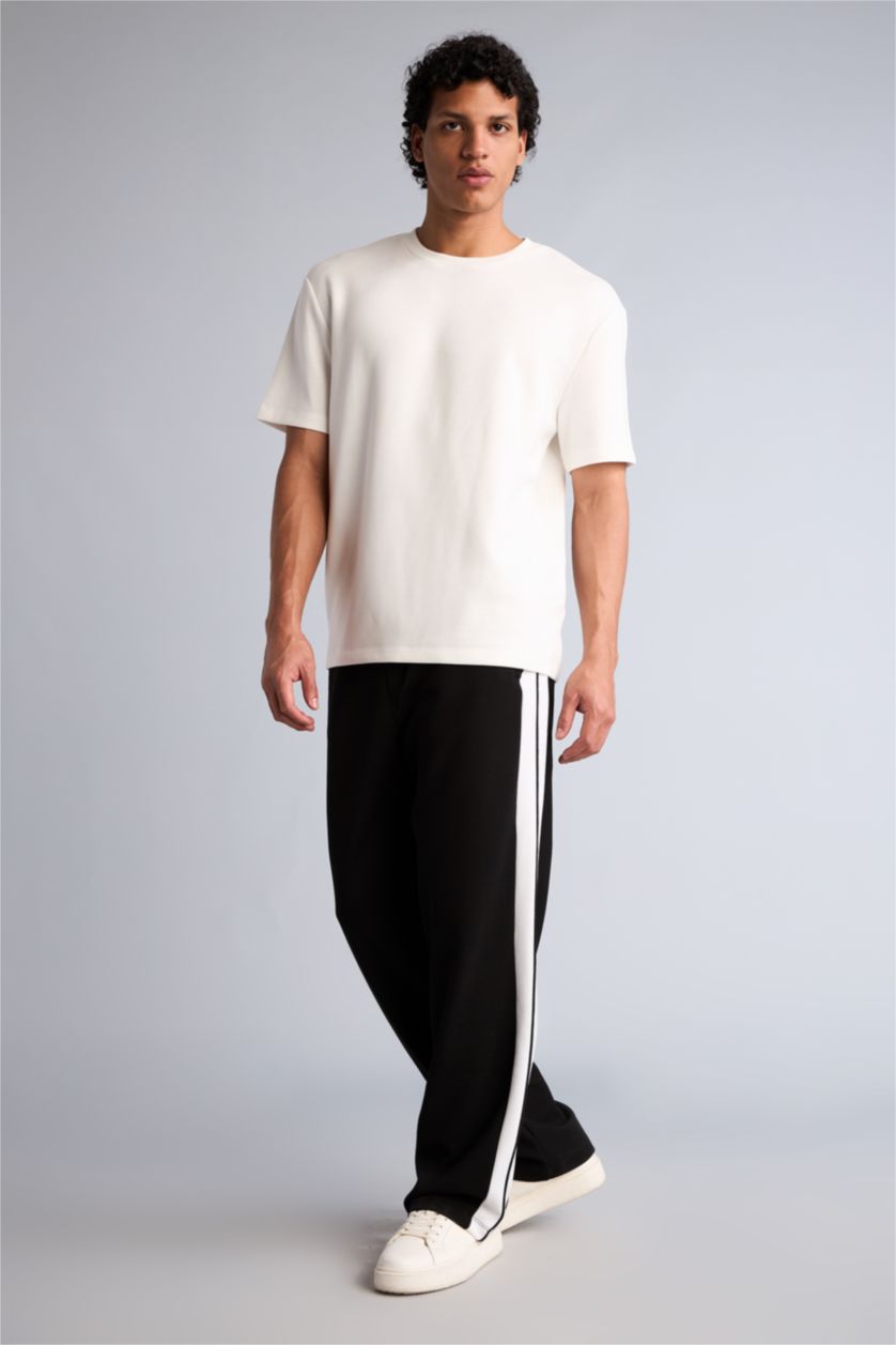 MAN Black Relax Fit Trousers
