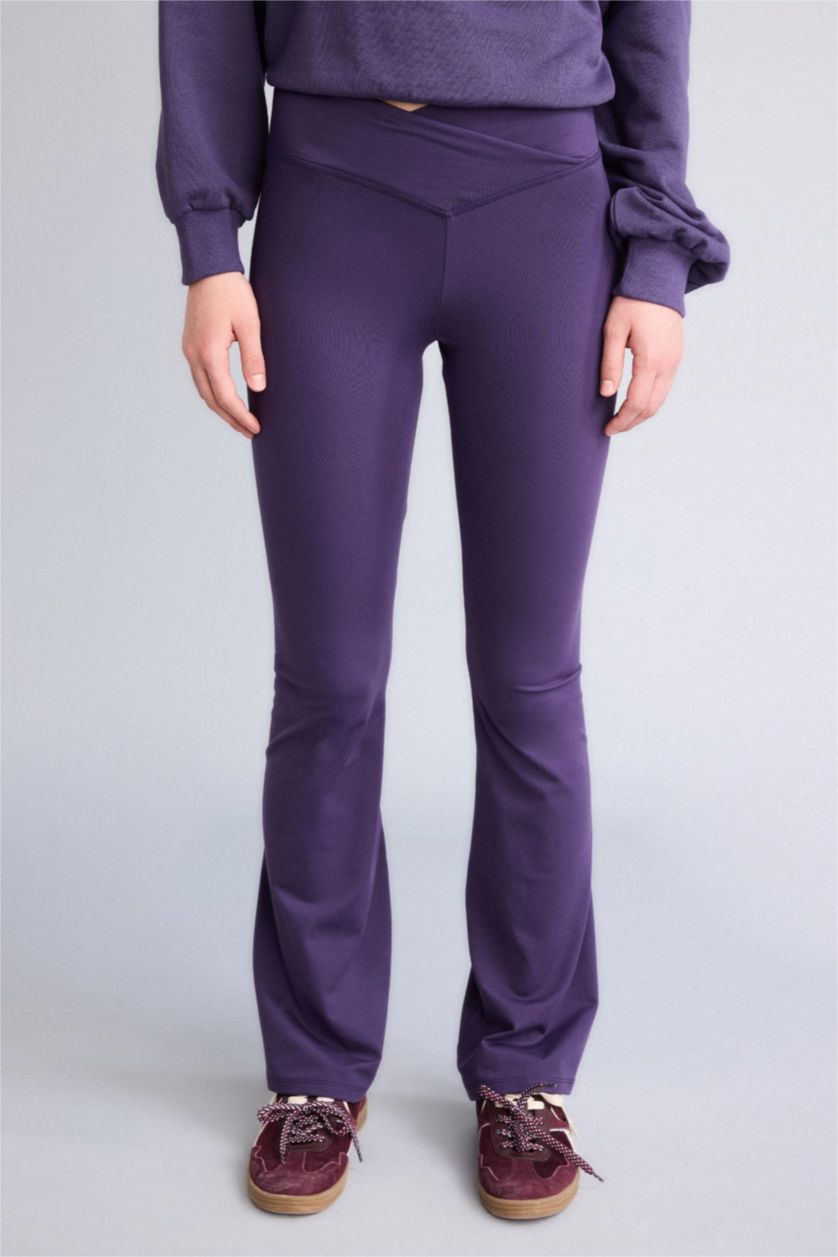 نساء بنفسجي توب بيزك سادة