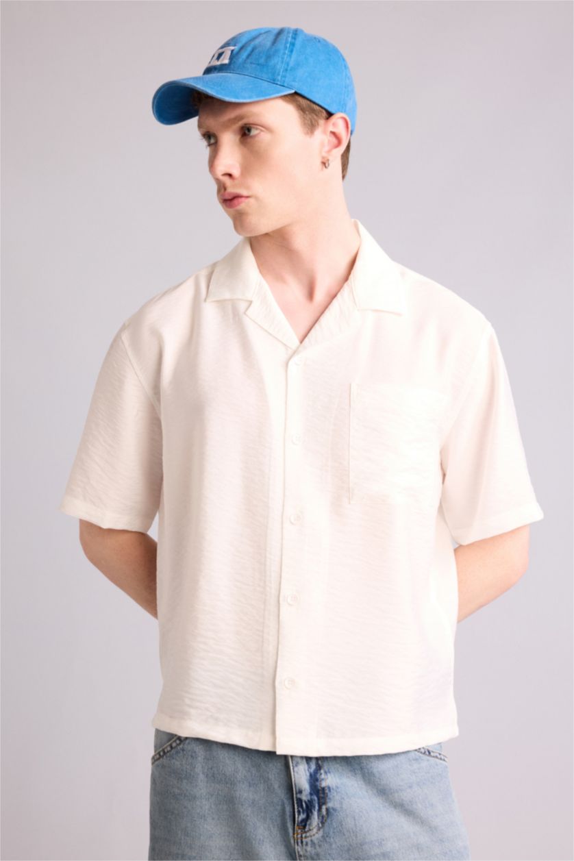 رجال بيج فاتح قميص نص ردن بوكسي فيت قماش كرنكيل