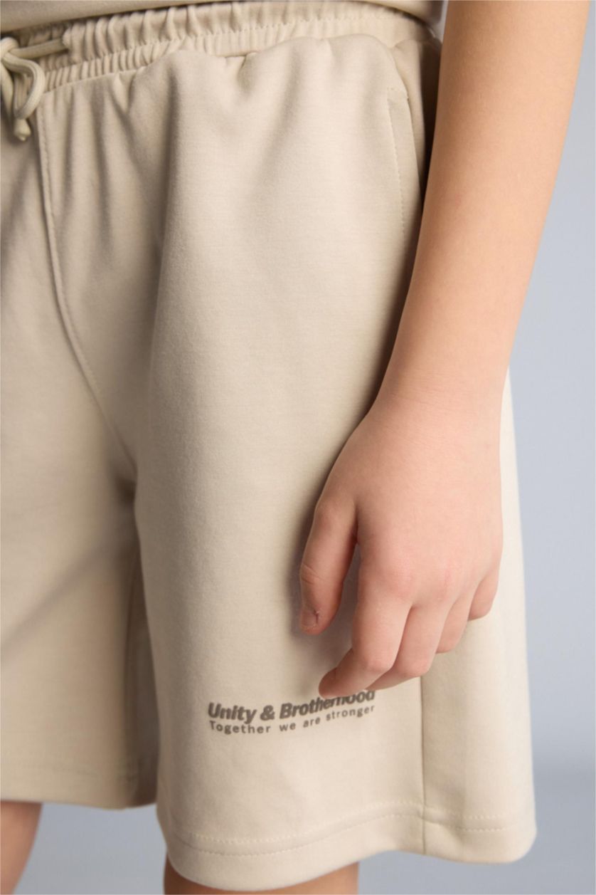 أولاد بيج شورت ولادي اوفر سايز بطبعة شعار