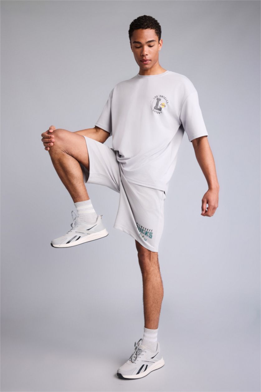 HOMME Gris Clair Standard Fit NBA Milwaukee Bucks Shorts