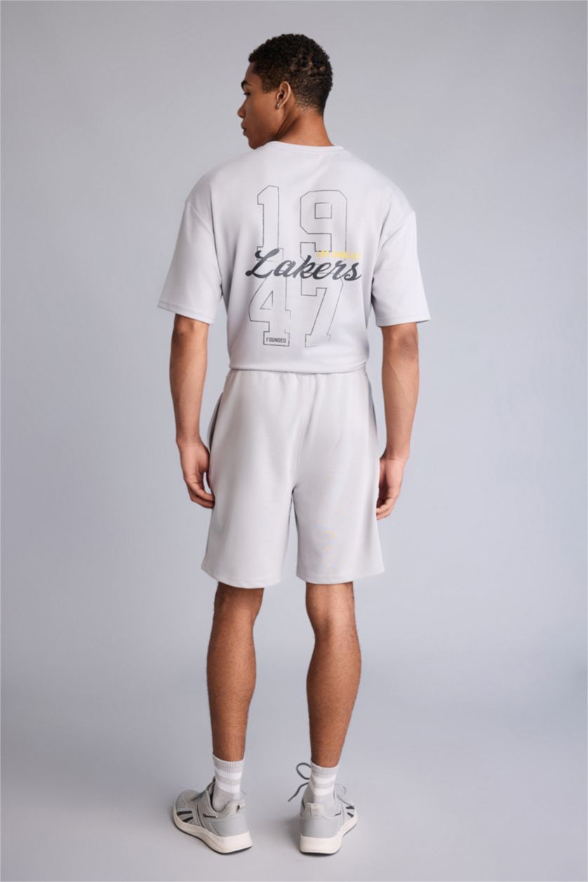 HOMME Gris Clair Standard Fit NBA Milwaukee Bucks Shorts