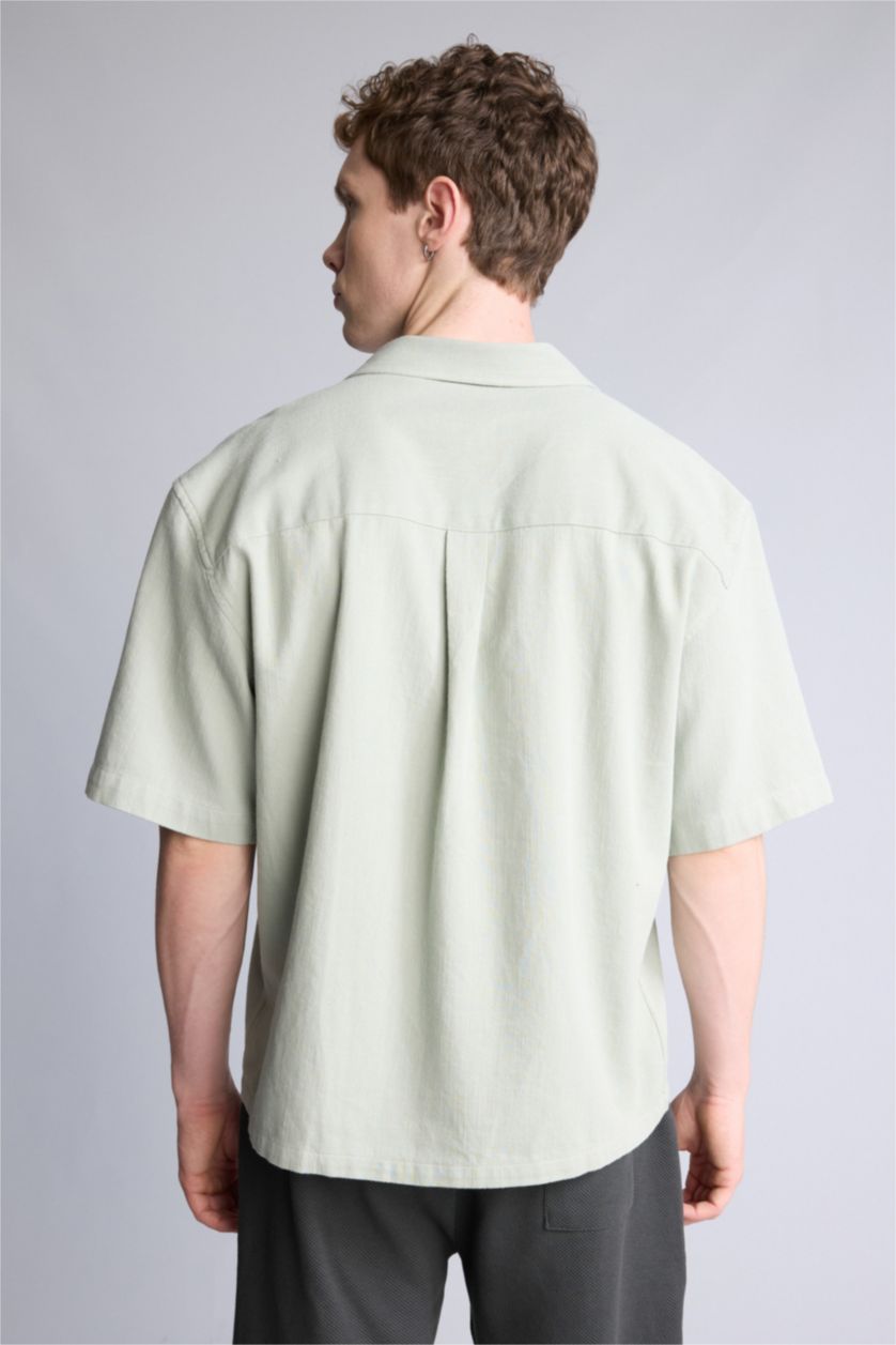 Erkek Açık Mavi Boxy Fıt Apaş Yaka Dokuma Kısa Kollu Gömlek