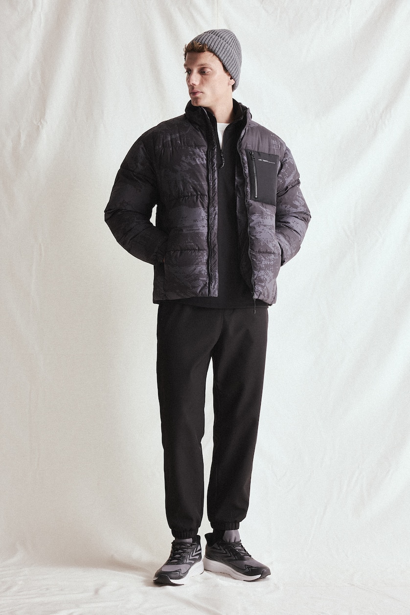 Men Black Regular Fit Mock-Neck Zippered Waterproof Jacket