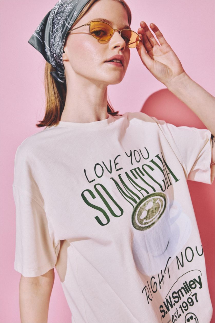 نساء بيج فاتح SmileyWorld Print Short Sleeve Oversize T-Shirt