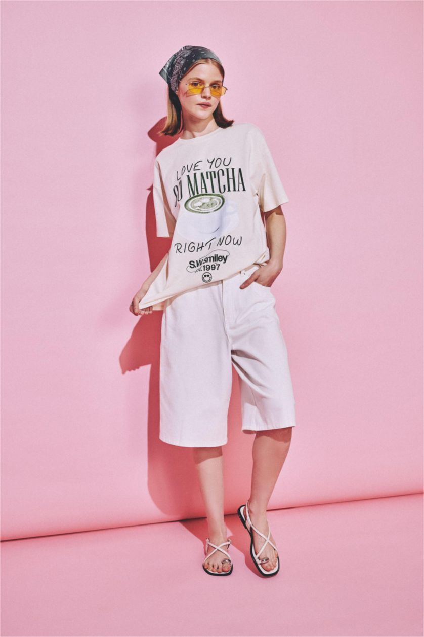 نساء بيج فاتح SmileyWorld Print Short Sleeve Oversize T-Shirt
