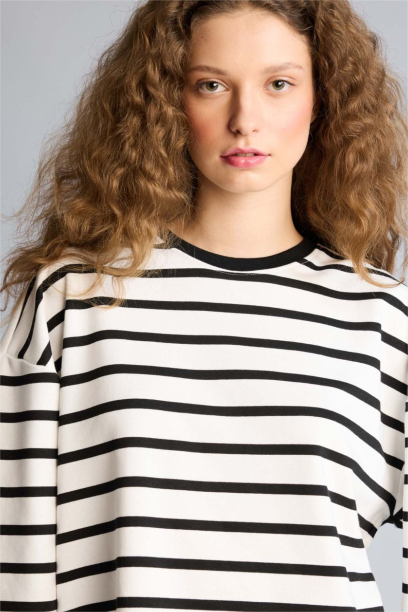 حريمي أسود تيشيرت اوفر سايز كم طويل