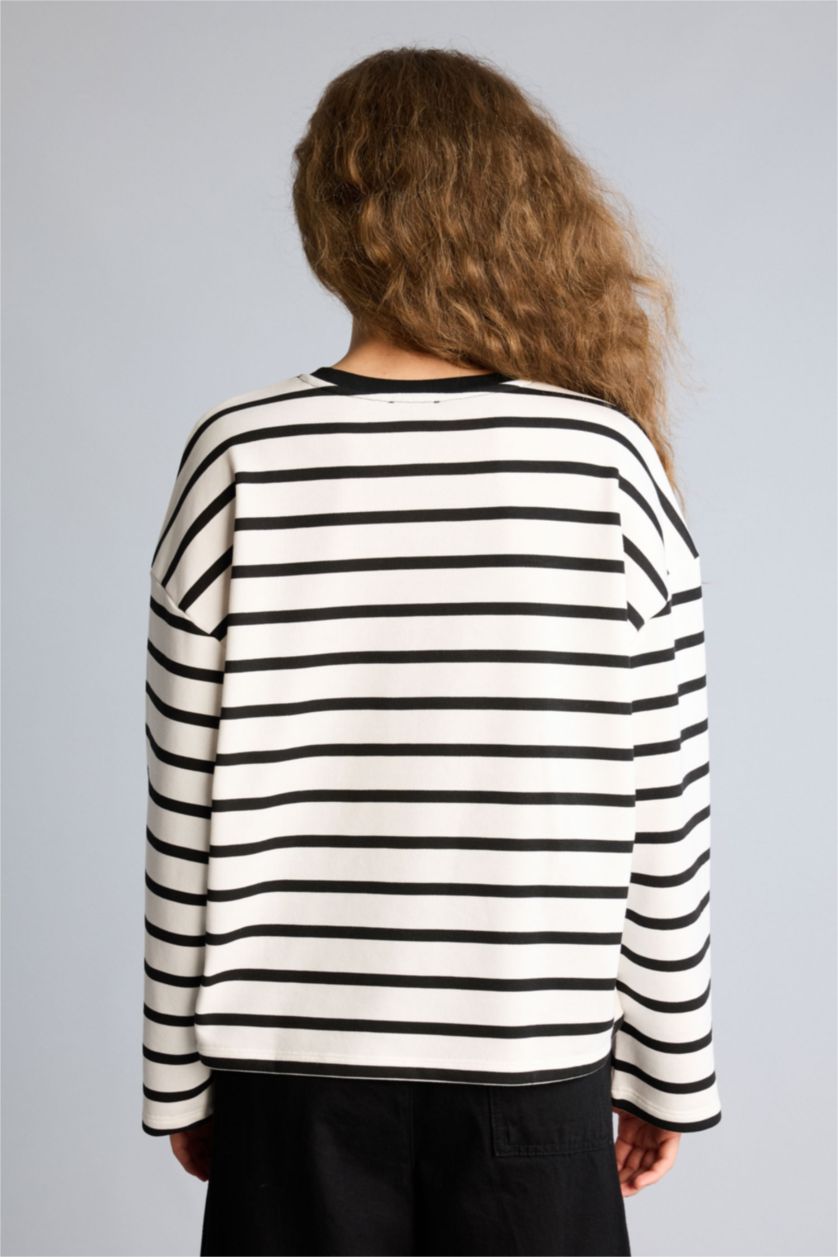 حريمي أسود تيشيرت اوفر سايز كم طويل