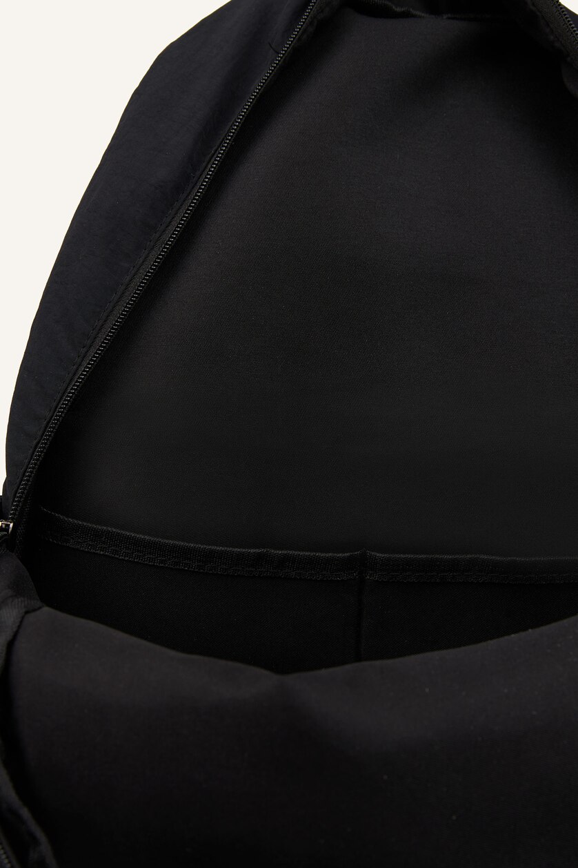 Woman Black Backpack