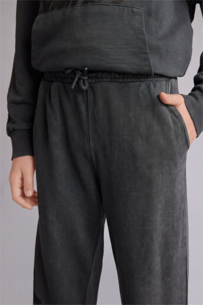 أولاد رمادي بنطرون بجامة رياضي ولادي قصة فضفاضة