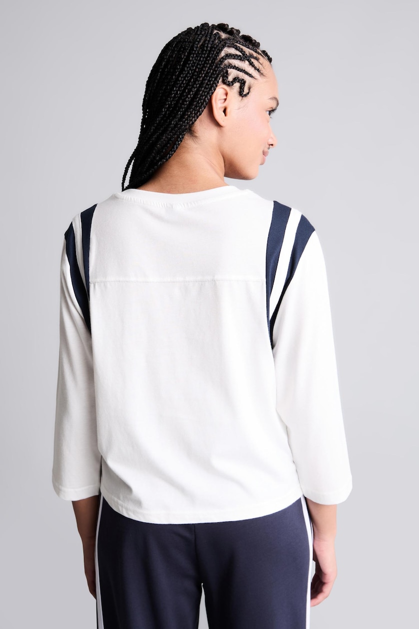 نساء بيج فاتح T-shirt de sport écru à col rond et manches longues Coupe standard