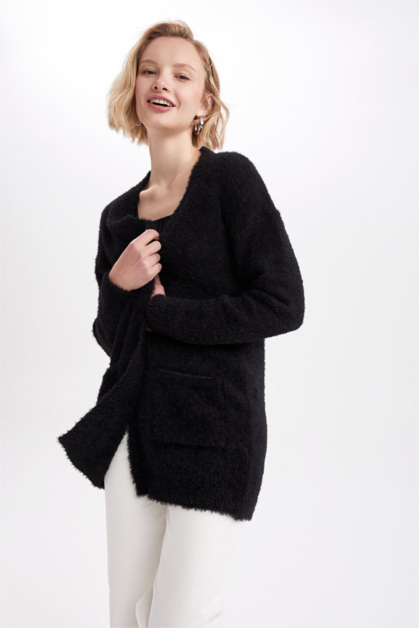 نساء أسود سويترتريكو بقصة عادية بكتف نازل مفصل بجيب