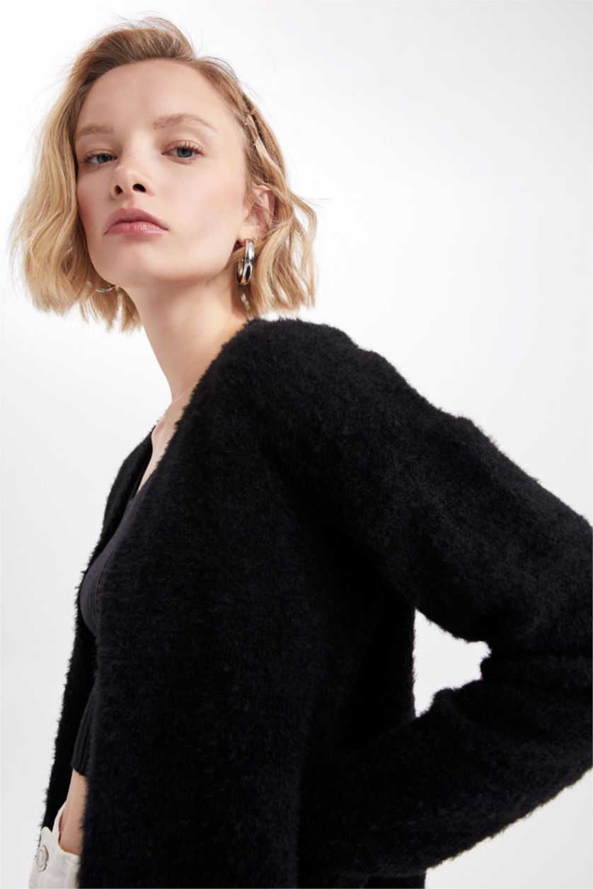 نساء أسود سويترتريكو بقصة عادية بكتف نازل مفصل بجيب