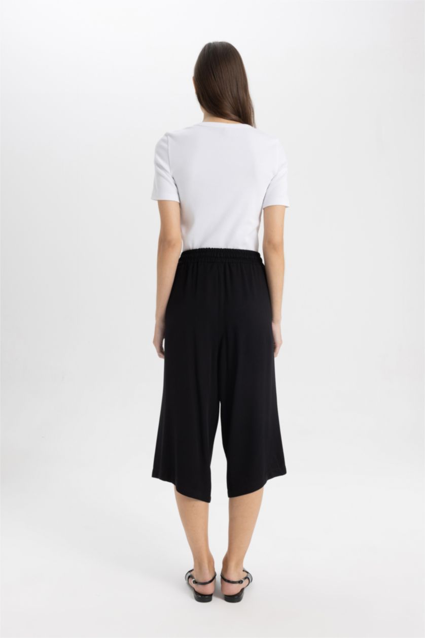 حريمي أسود بنطلون كابري كروب فيت بخصر عالي