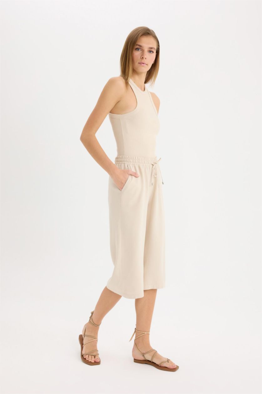 نساء اللون الحجري بنطلون كابري بالمندو بجيب وخصر عالي