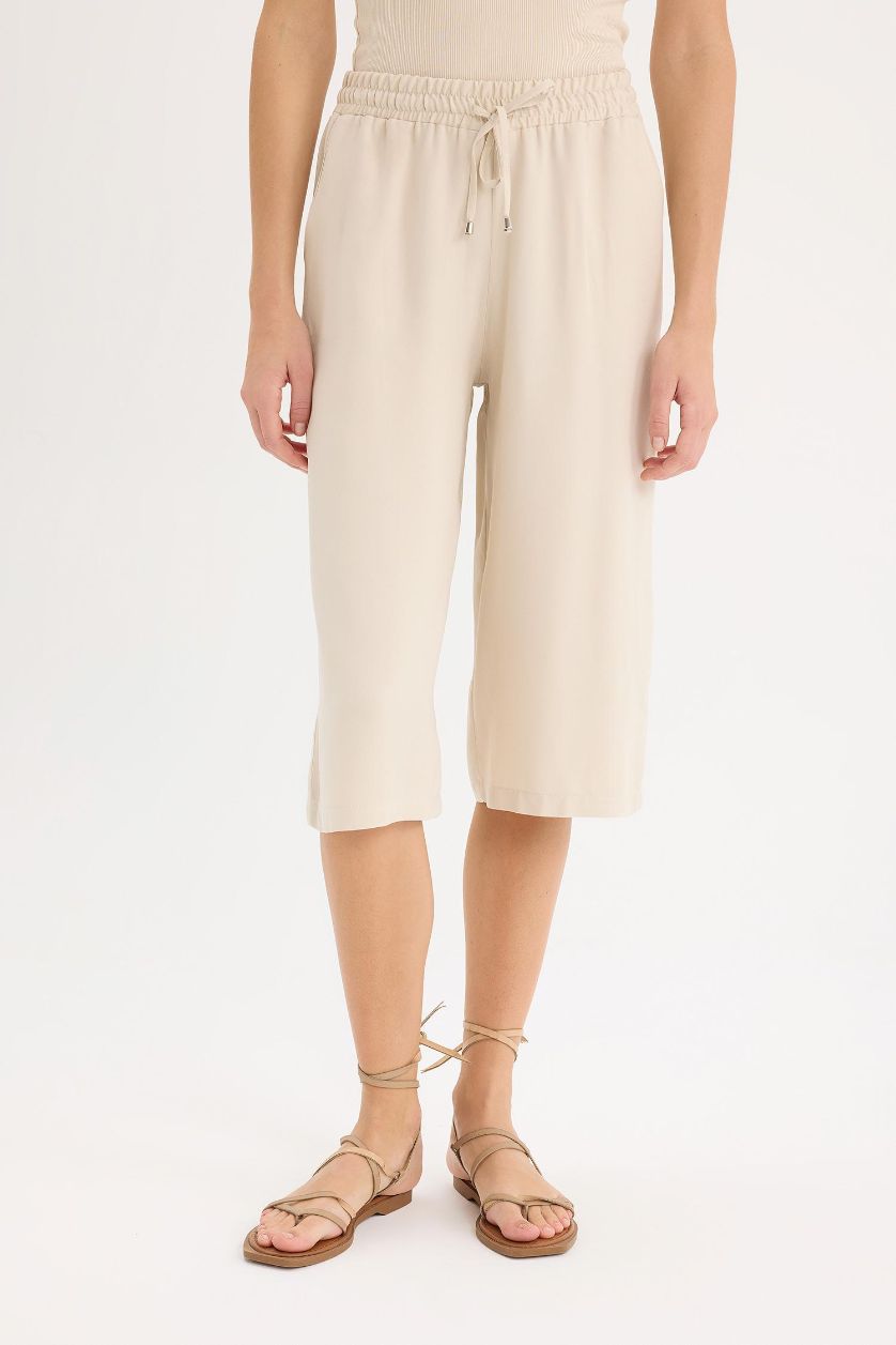 نساء اللون الحجري بنطلون كابري بالمندو بجيب وخصر عالي