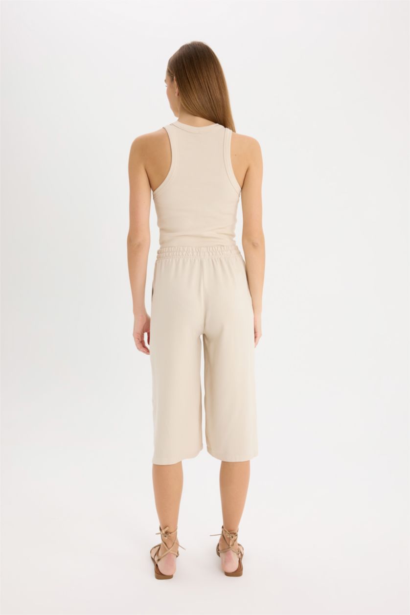 نساء اللون الحجري بنطلون كابري بالمندو بجيب وخصر عالي