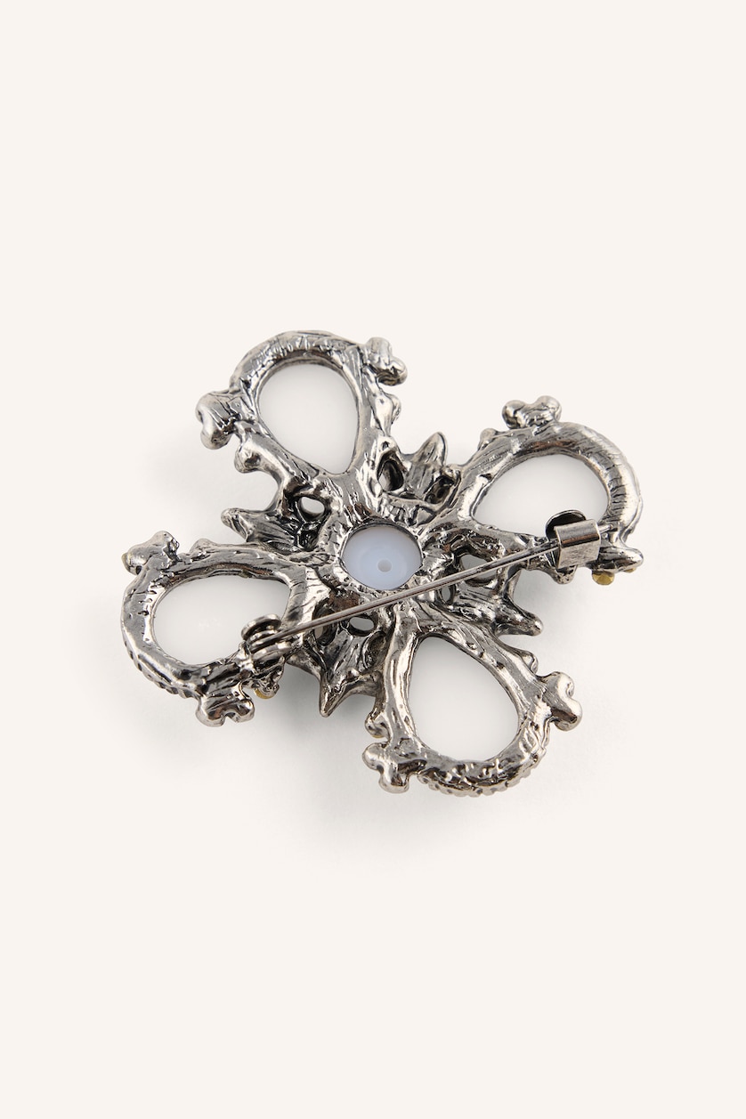 Women Karma Brooch
