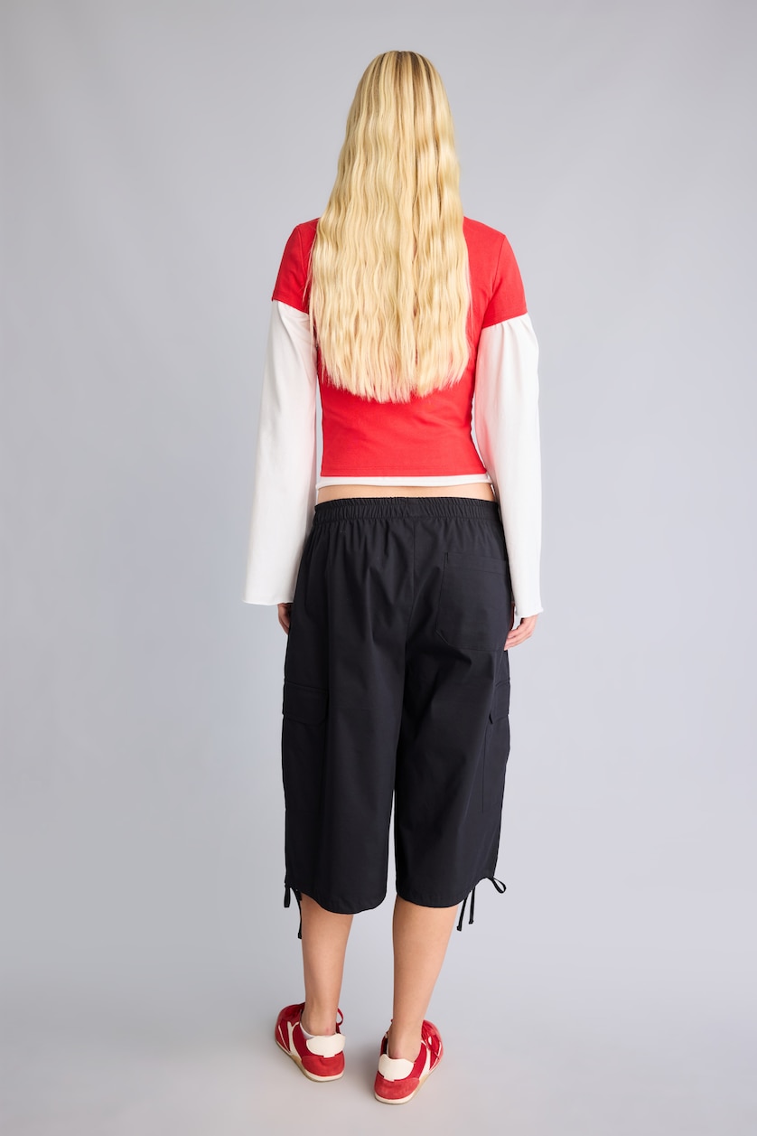 حريمي أسود شورت برمودا كارجو بأستك من تحت