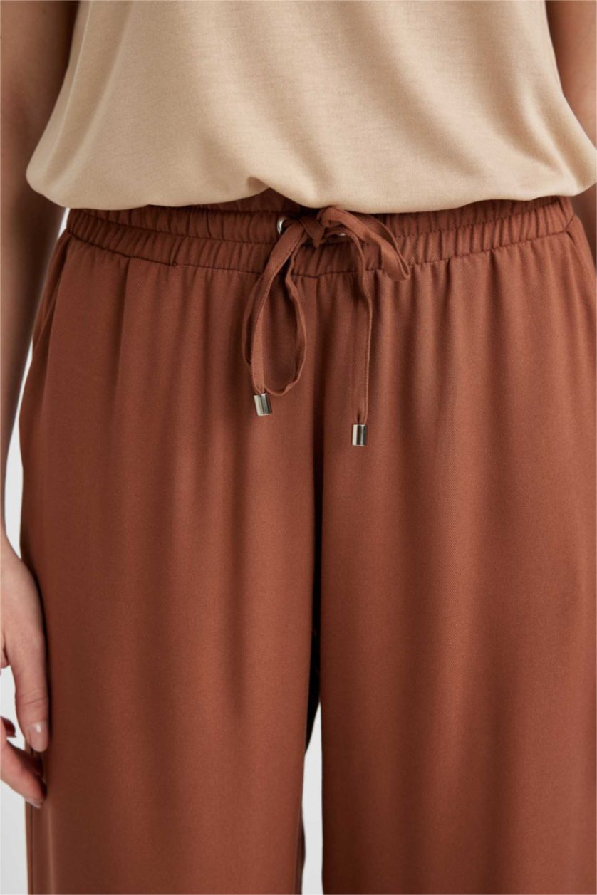 نساء بني بنطلون فيسكوز فلورايدا وايد ليج بجيب