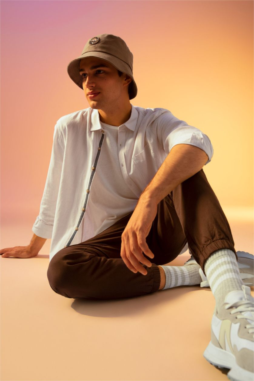 رجال بيج قميص بأكمام طويلة منقوش بقصة ضيقة