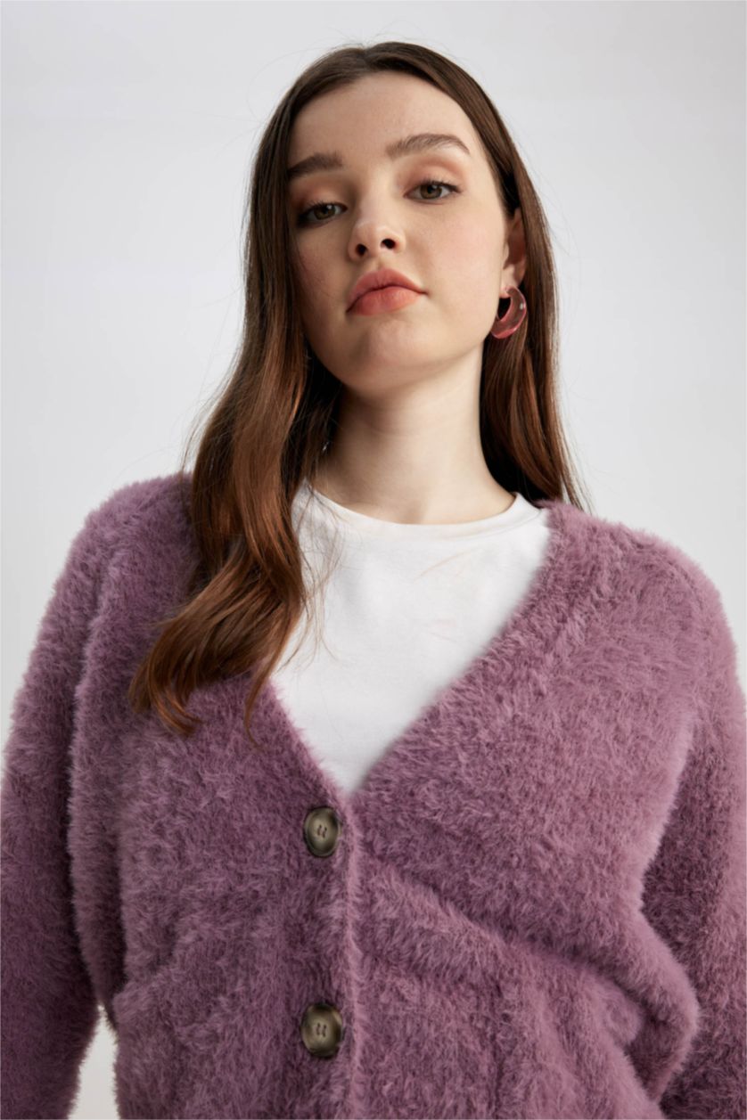 نساء وردي جاكيت قطيفة اوفر سايز بياقة V