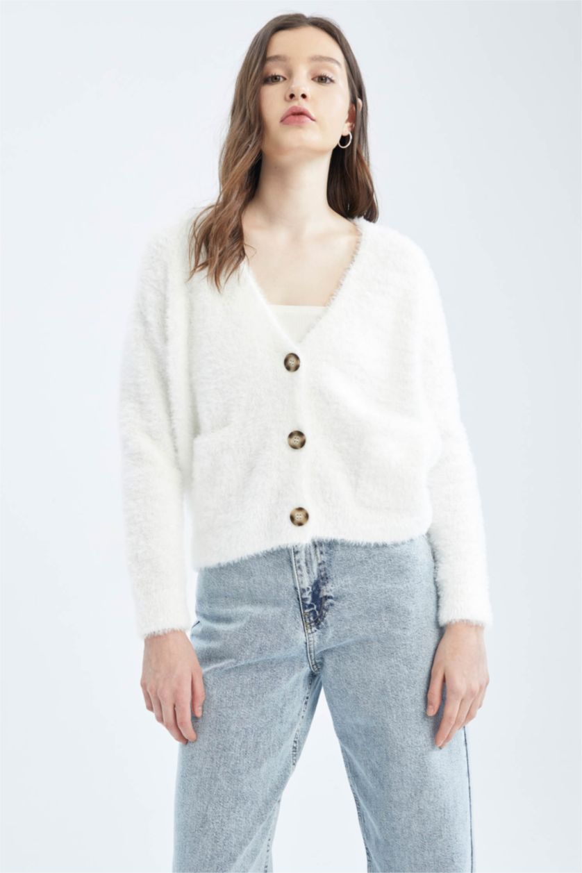 نساء بيج فاتح جاكيت قطيفة اوفر سايز بياقة V