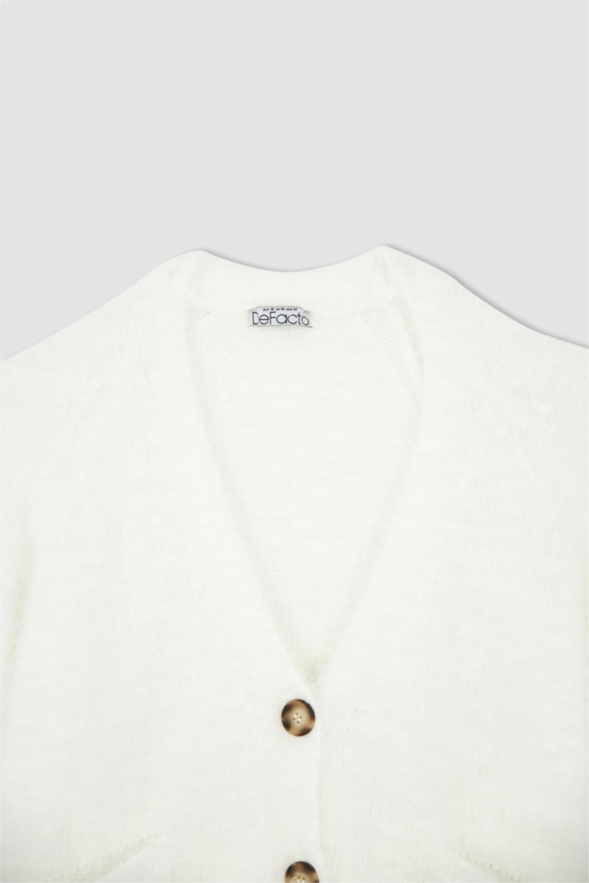 نساء بيج فاتح جاكيت قطيفة اوفر سايز بياقة V