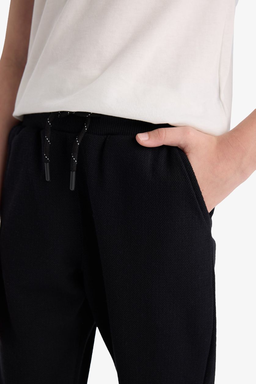 أولادي أسود بنطلون سويت بانتس جوجر اولادي قصة عادية