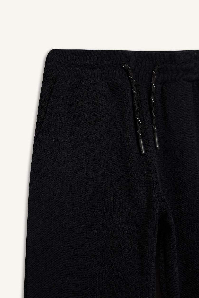 أولادي أسود بنطلون سويت بانتس جوجر اولادي قصة عادية