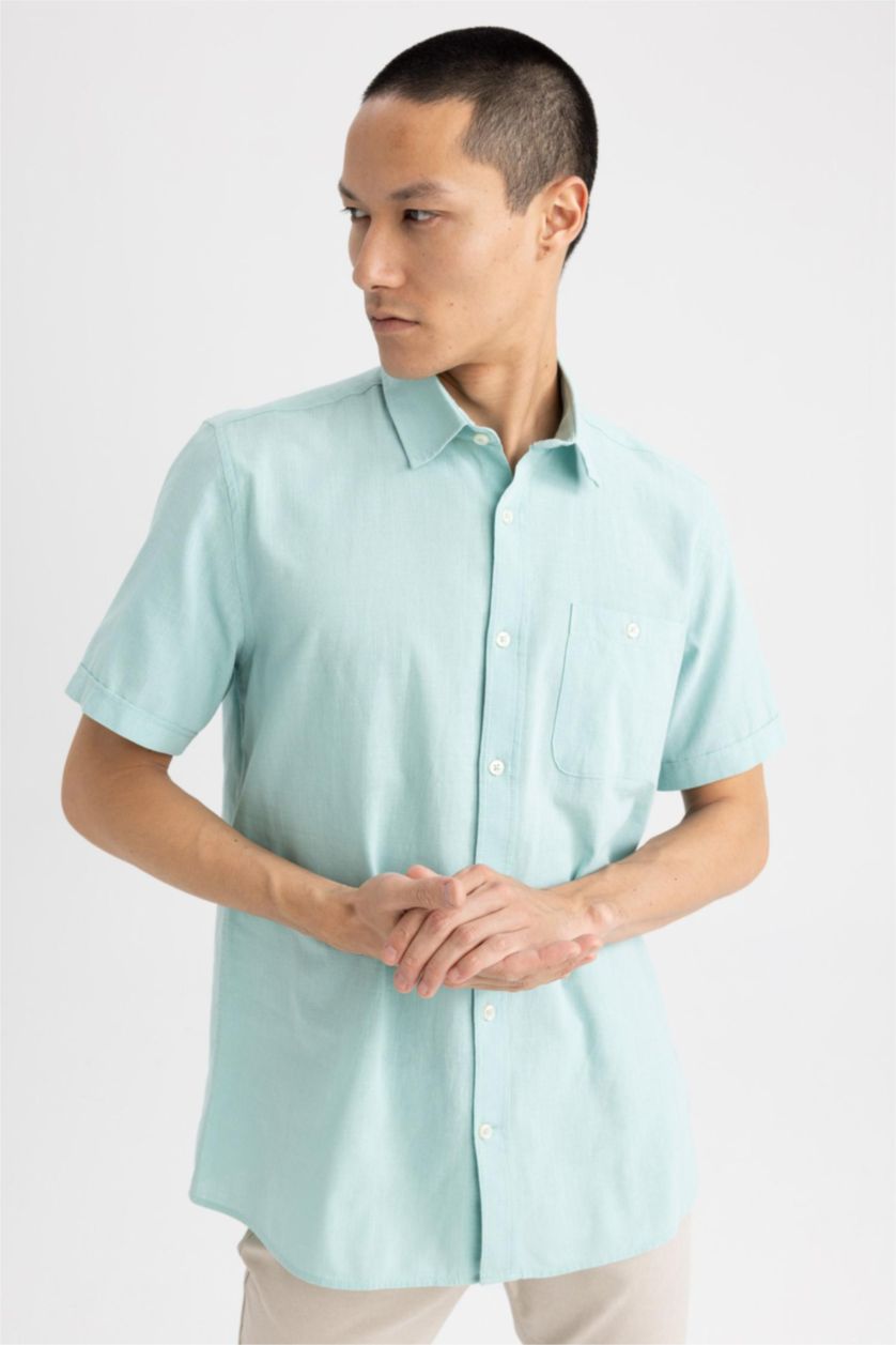 رجال أزرق محيطي قميص بولو قطن قصة عادية