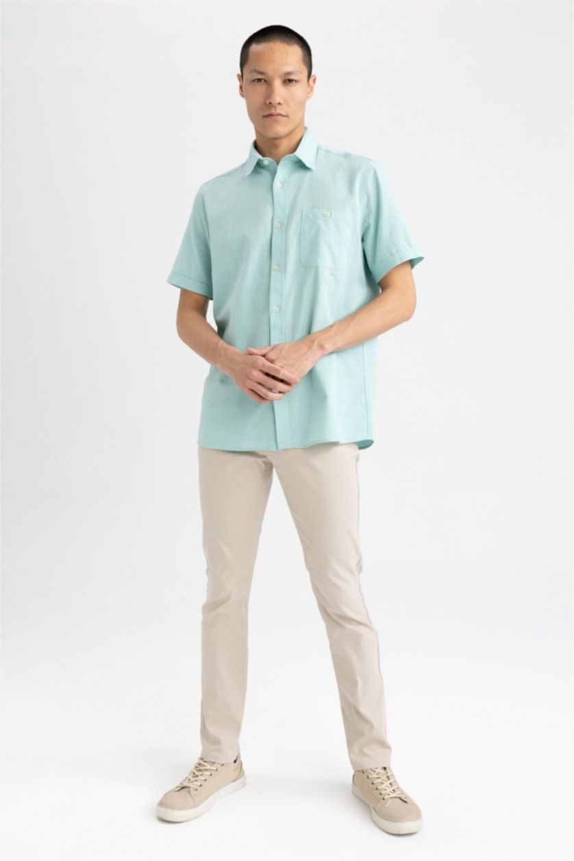 رجال أزرق محيطي قميص بولو قطن قصة عادية