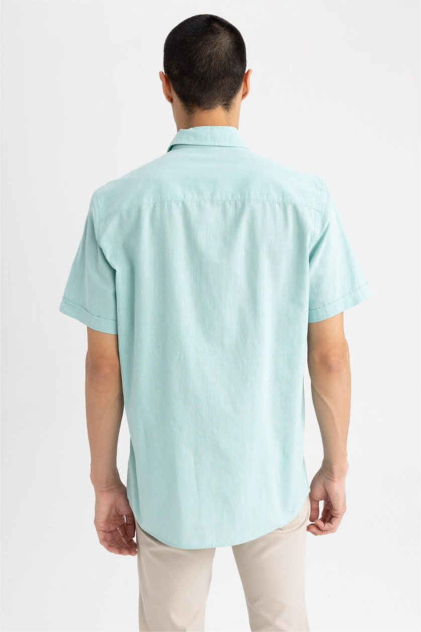 رجال أزرق محيطي قميص بولو قطن قصة عادية