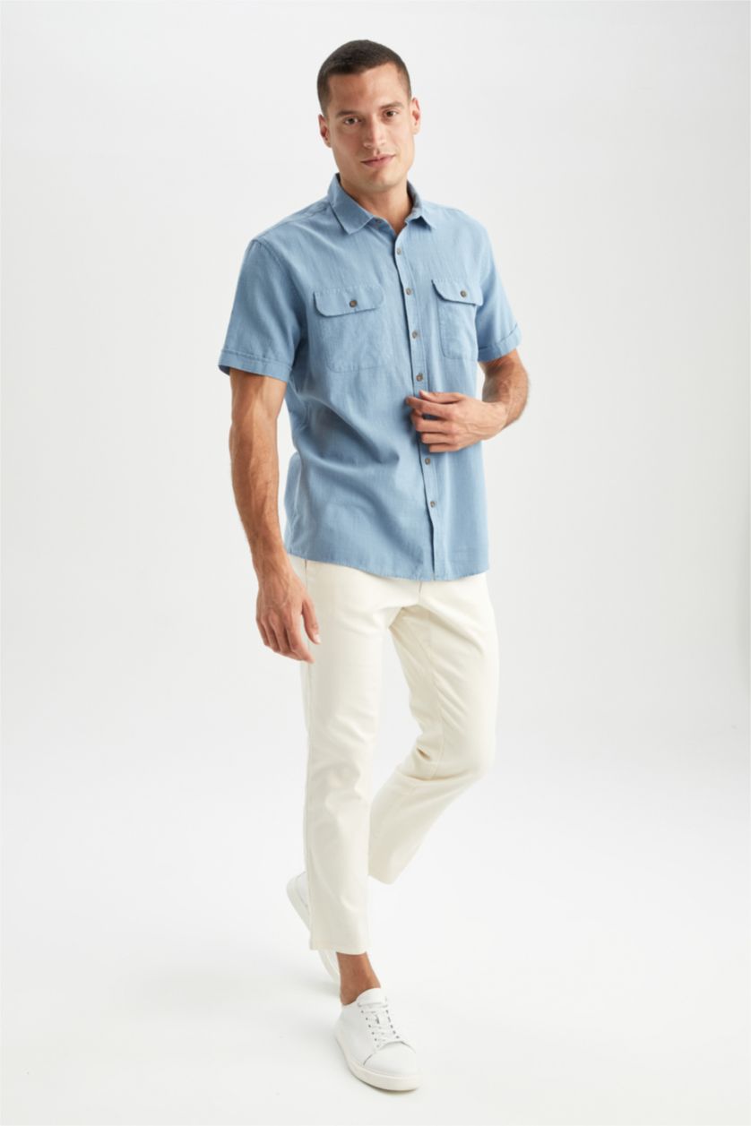 HOMME Bleu Chemise à manches courtes et col polo coupe classique