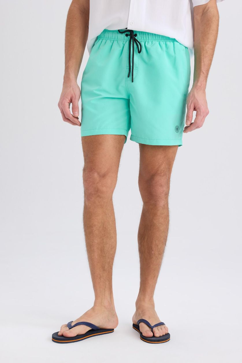 HOMME Bleu Short de bain court avec doublure filet