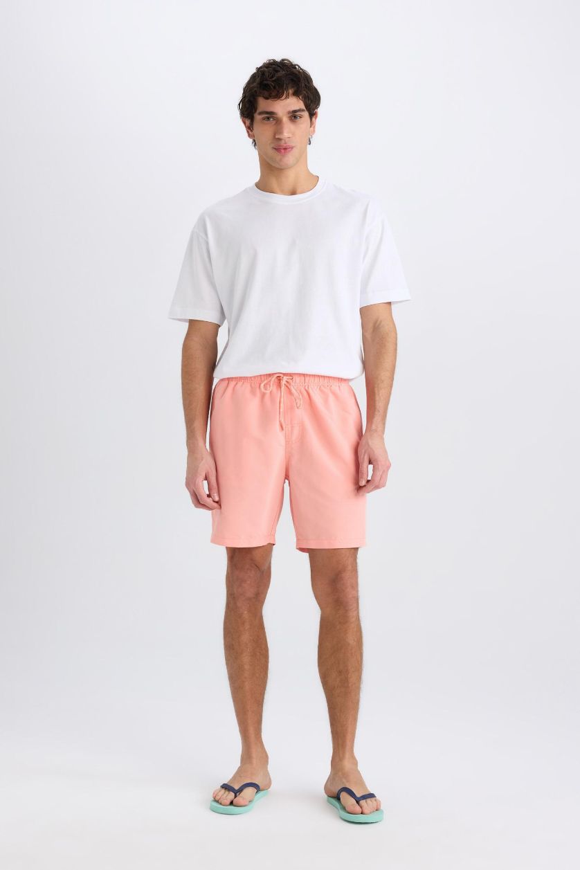 HOMME Orange Short de bain court avec doublure en filet