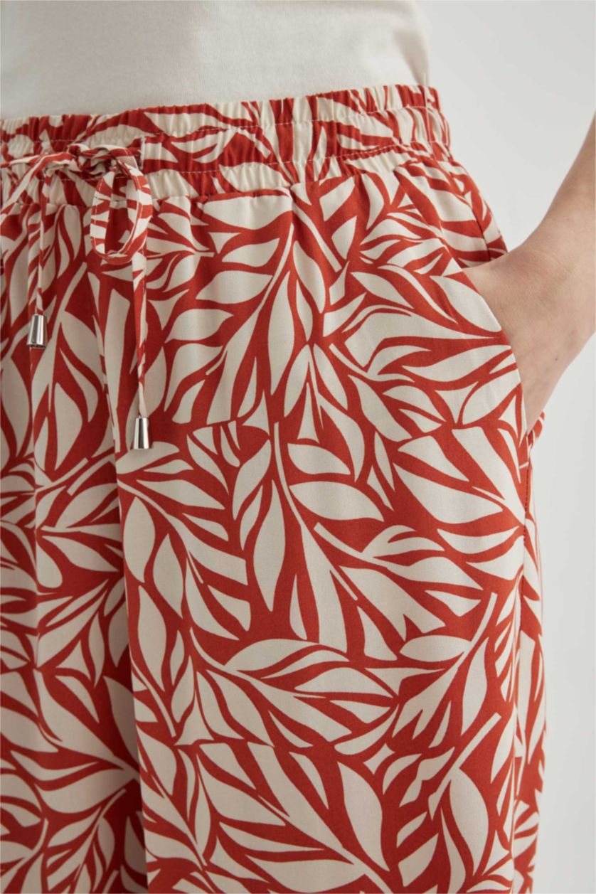 حريمي برتقالي كابري كروب فيت فيسكوز بخصر عالي