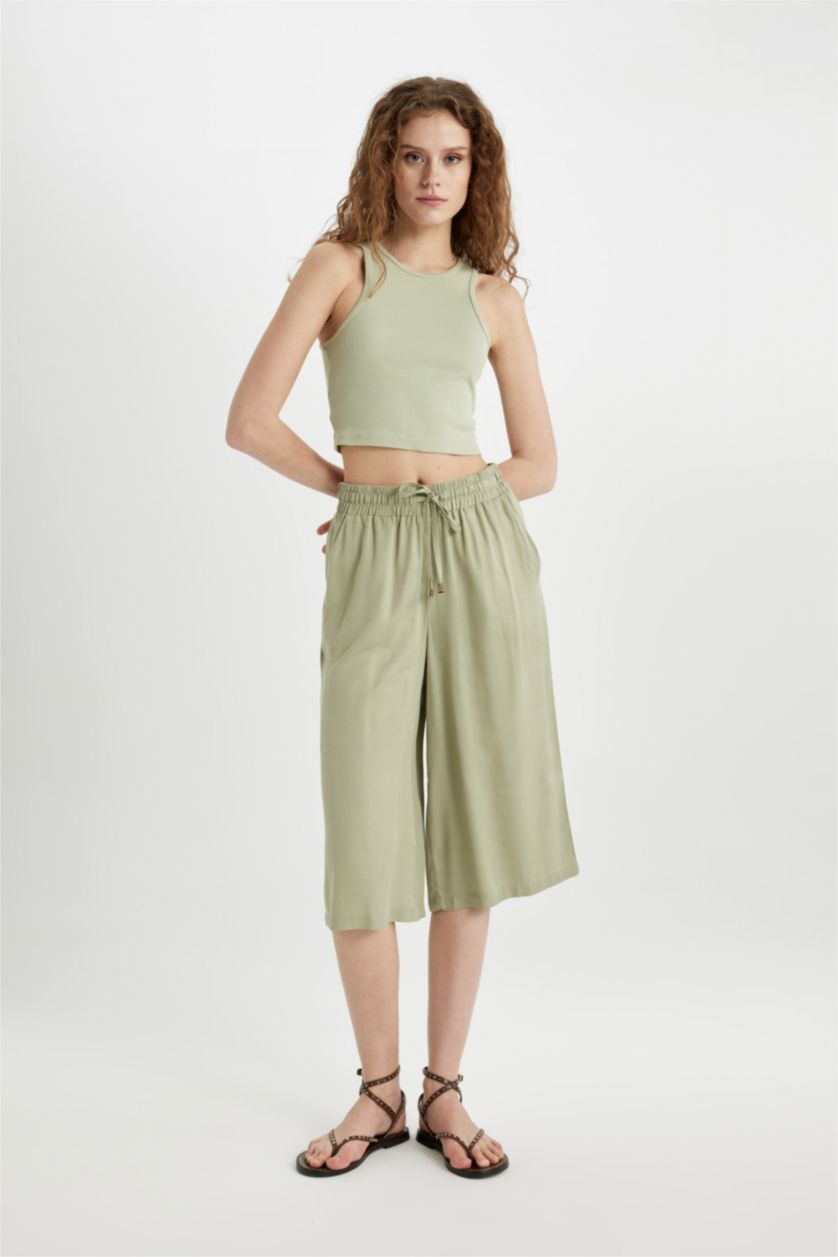 حريمي كاكي فاتح كابري كروب فيت فيسكوز بخصر عالي