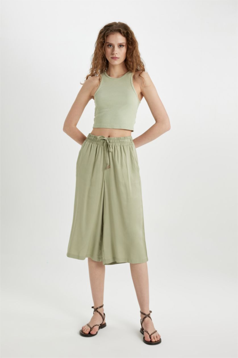 حريمي كاكي فاتح كابري كروب فيت فيسكوز بخصر عالي