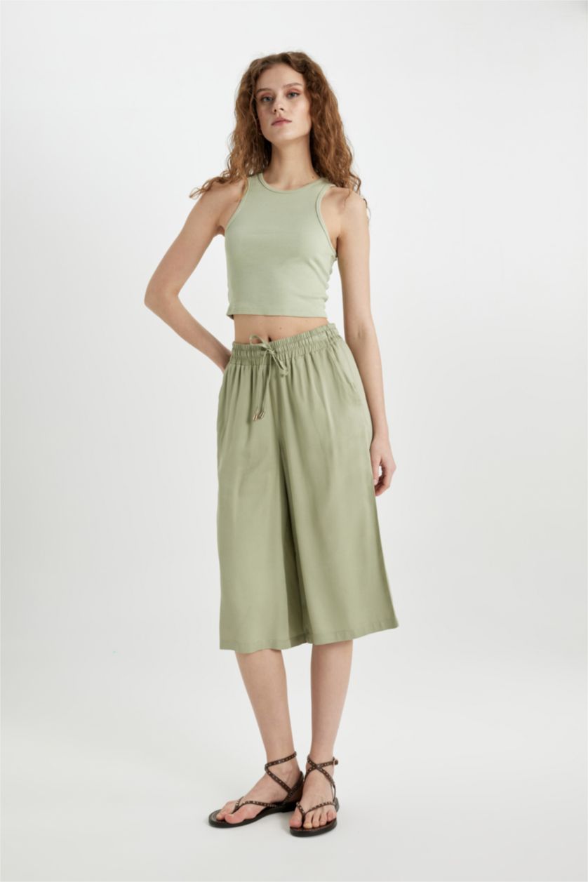 حريمي كاكي فاتح كابري كروب فيت فيسكوز بخصر عالي